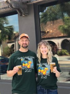 Courtney and Eric Boettcher enjoying 2020 Loquat Beer at the Cotee River Brewing Company, April 2020 